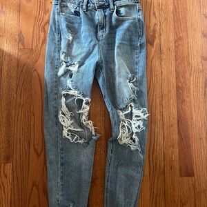 Cello high-waisted distressed denim jeans with ripped knees and raw hem